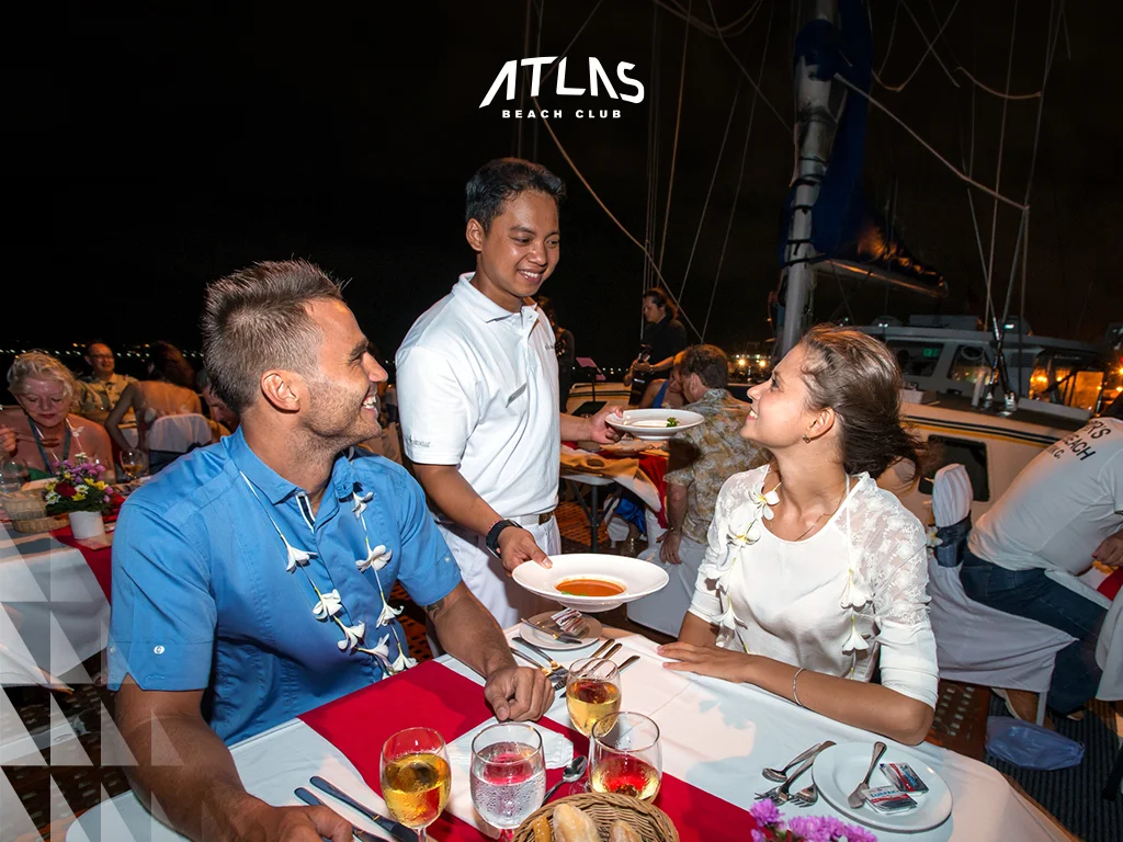 luxury catamaran, sunset, and gourmet meal, bumble date in bali